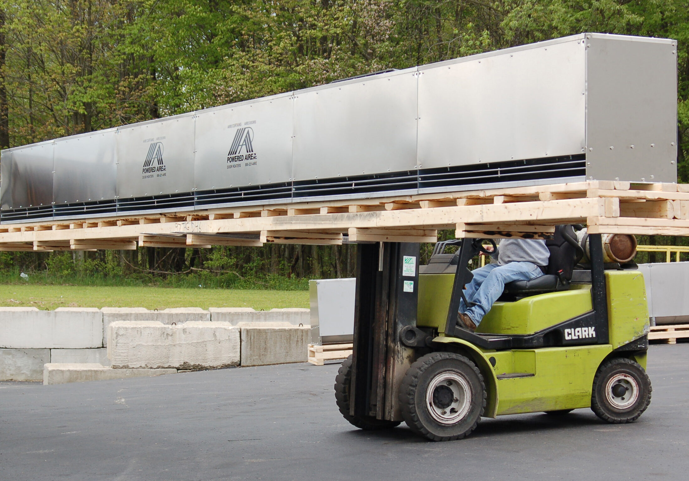 Powered Aire Curtain - Wayne Dalton Project Air curtain being transported by a lift unit